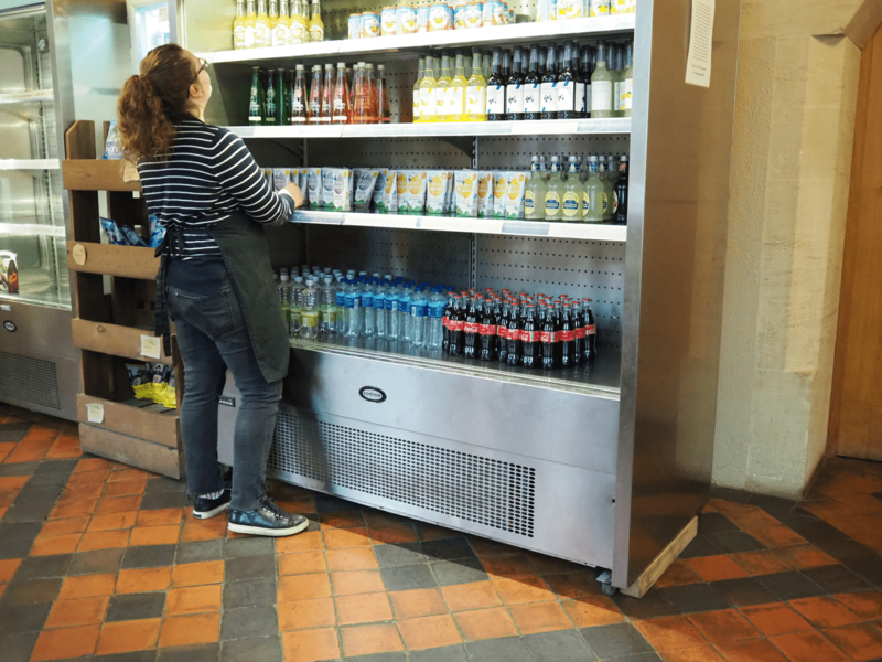 The drink self-service fridge in the cafe with four shelves