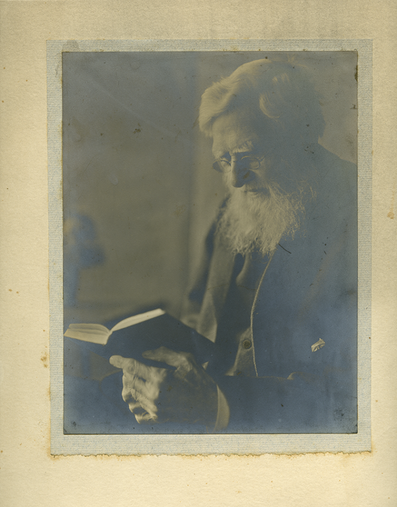 alfred russel wallace photo with book