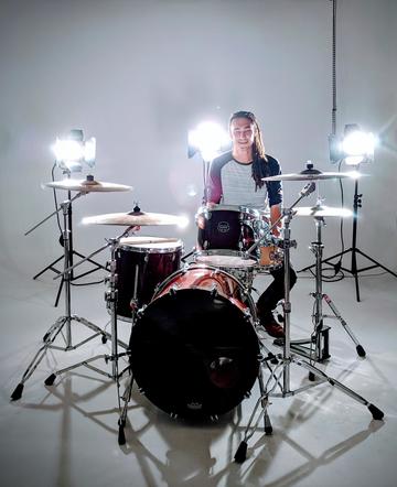Ben playing the drums